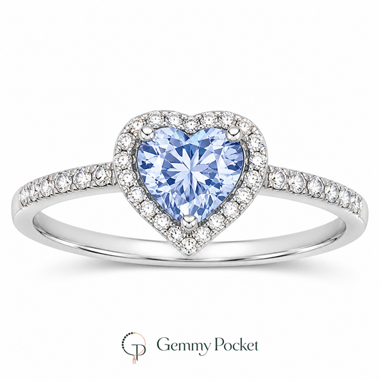 Silver-color blue heart halo ring on a seamless white studio background
