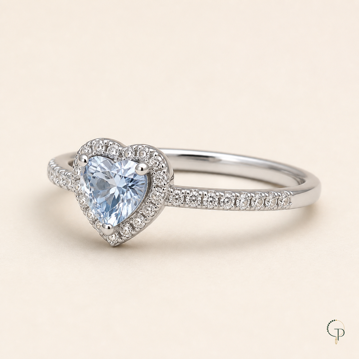 Three-quarter construction view of the silver-color blue heart halo ring