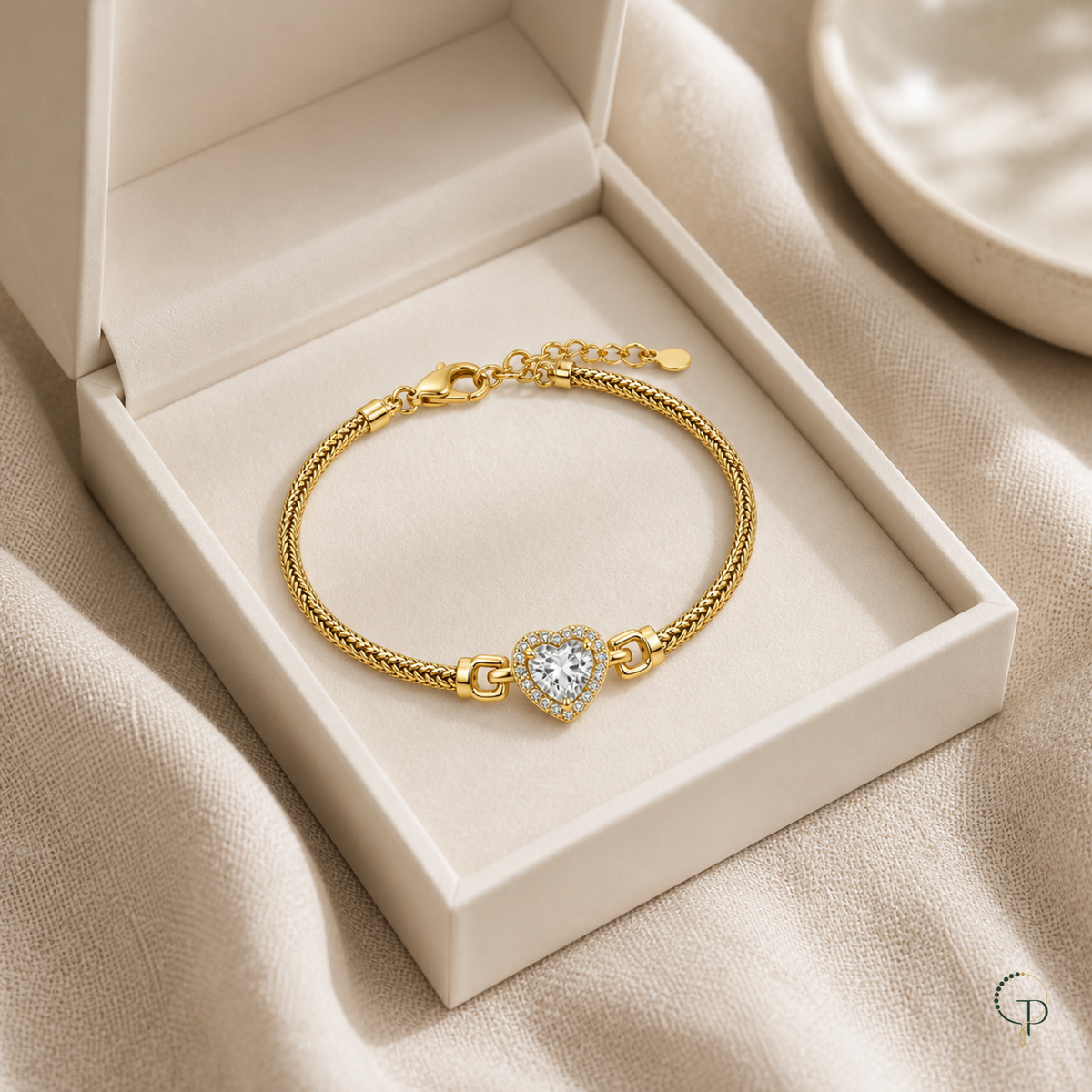 Heart halo bracelet styled in an open unbranded ivory jewelry box