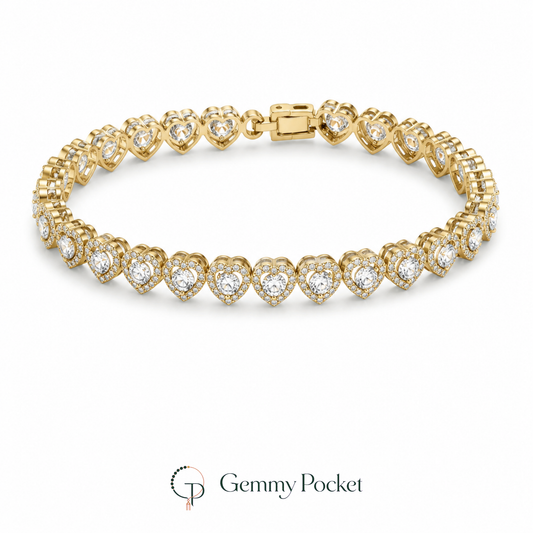 Gold-color repeating heart-link bracelet on a seamless white studio background