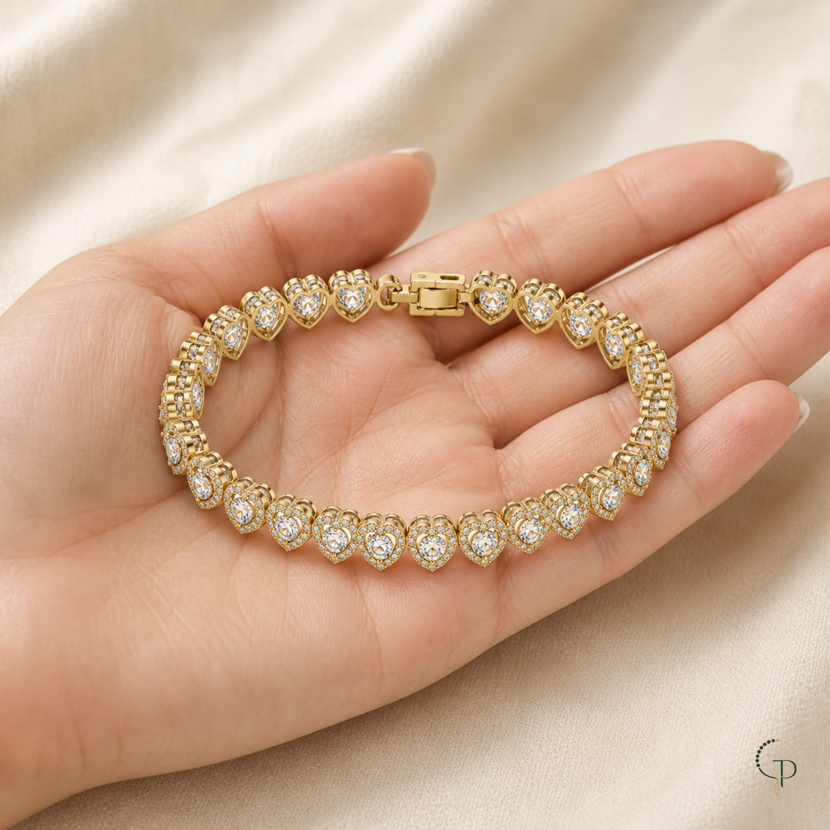 Clear-stone heart-link bracelet displayed on an anonymous hand for scale