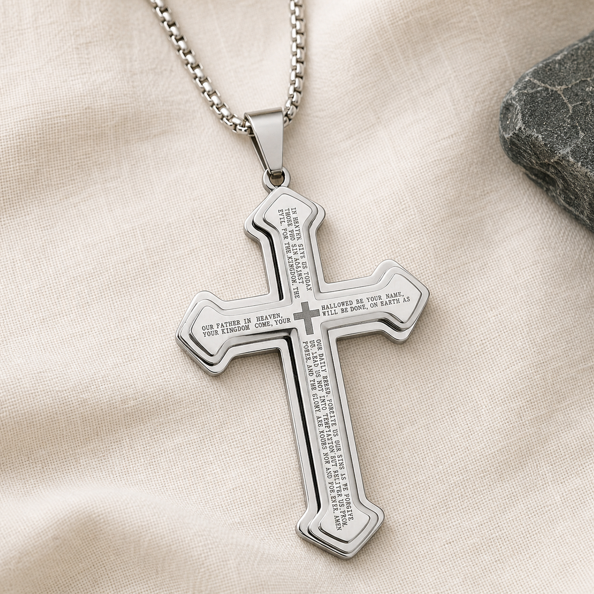 Iron finish Our Father cross pendant necklace on ivory linen