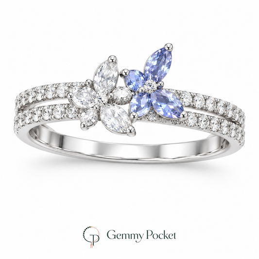 Silver-tone double butterfly ring with clear and pale blue wings on white