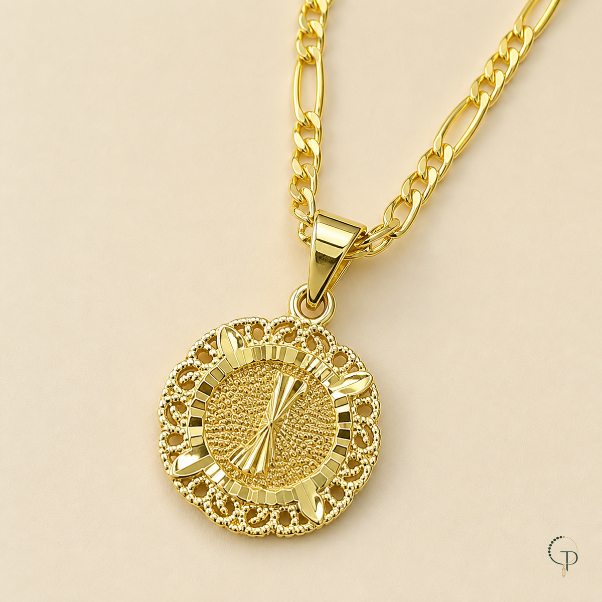 Close view of the long-short link chain, flared bail and round filigree pendant