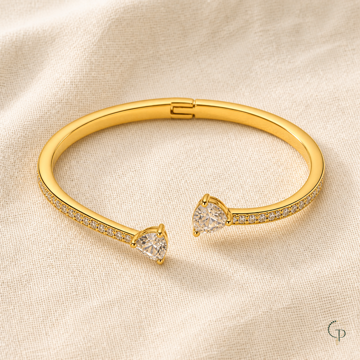 Complete bangle construction showing staggered heart terminals and rear hinge