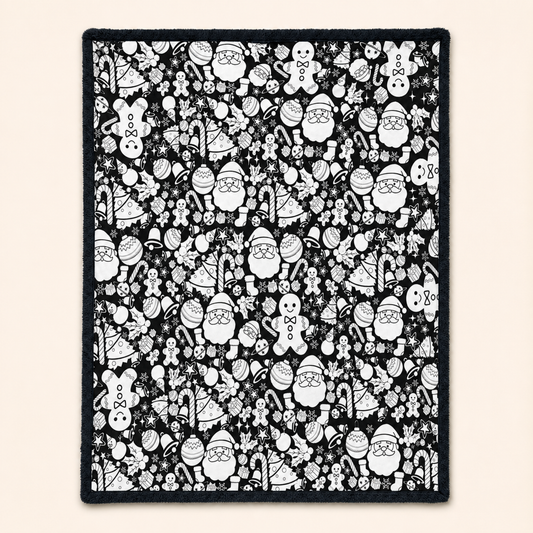 Christmas doodle coloring blanket with black edging on an ivory background