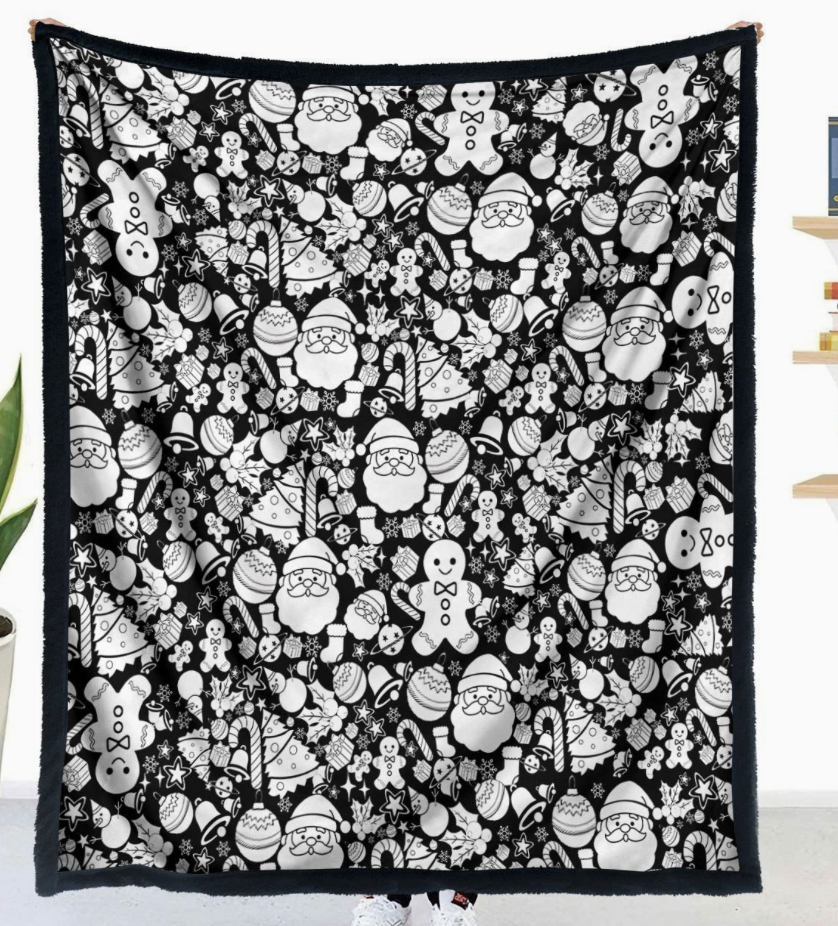 Original Christmas blanket pattern showing Santa, gingerbread people, trees, bells and ornaments