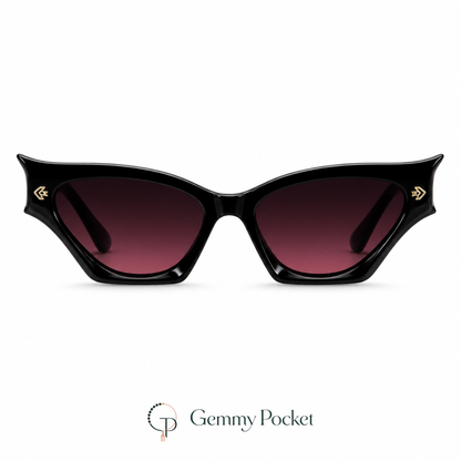 Halloween black cat-eye sunglasses with dark burgundy-gradient lenses on a white studio background