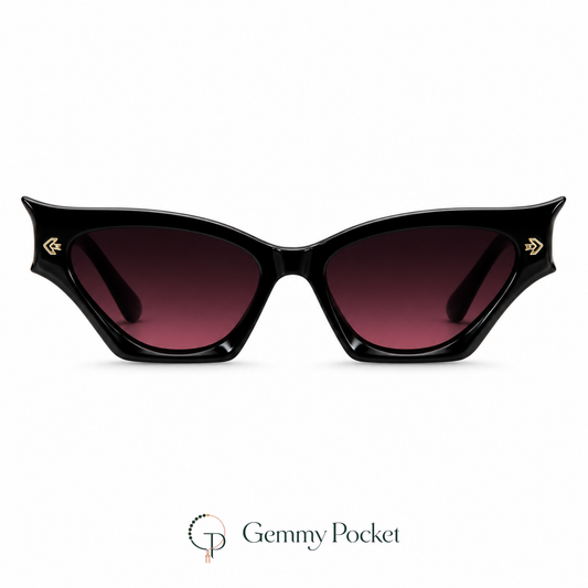 Halloween black cat-eye sunglasses with dark burgundy-gradient lenses on a white studio background