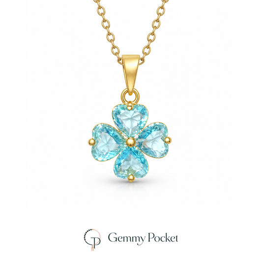 Aqua heart-cut four-leaf clover pendant necklace on a seamless white studio background