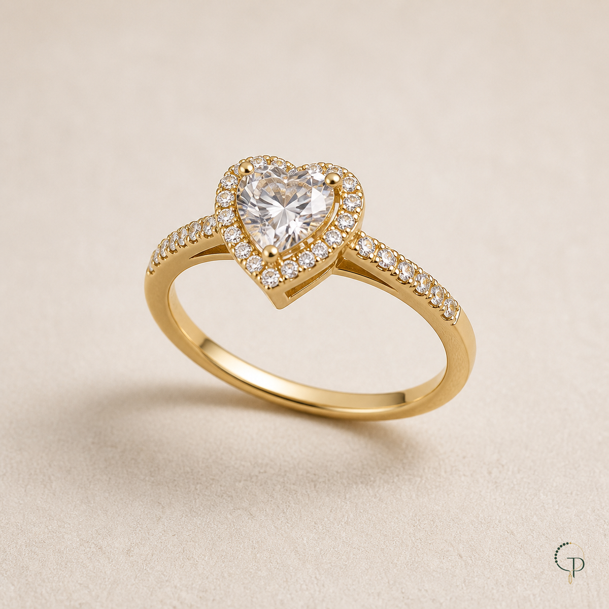 Three-quarter construction view of a gold-color heart halo ring