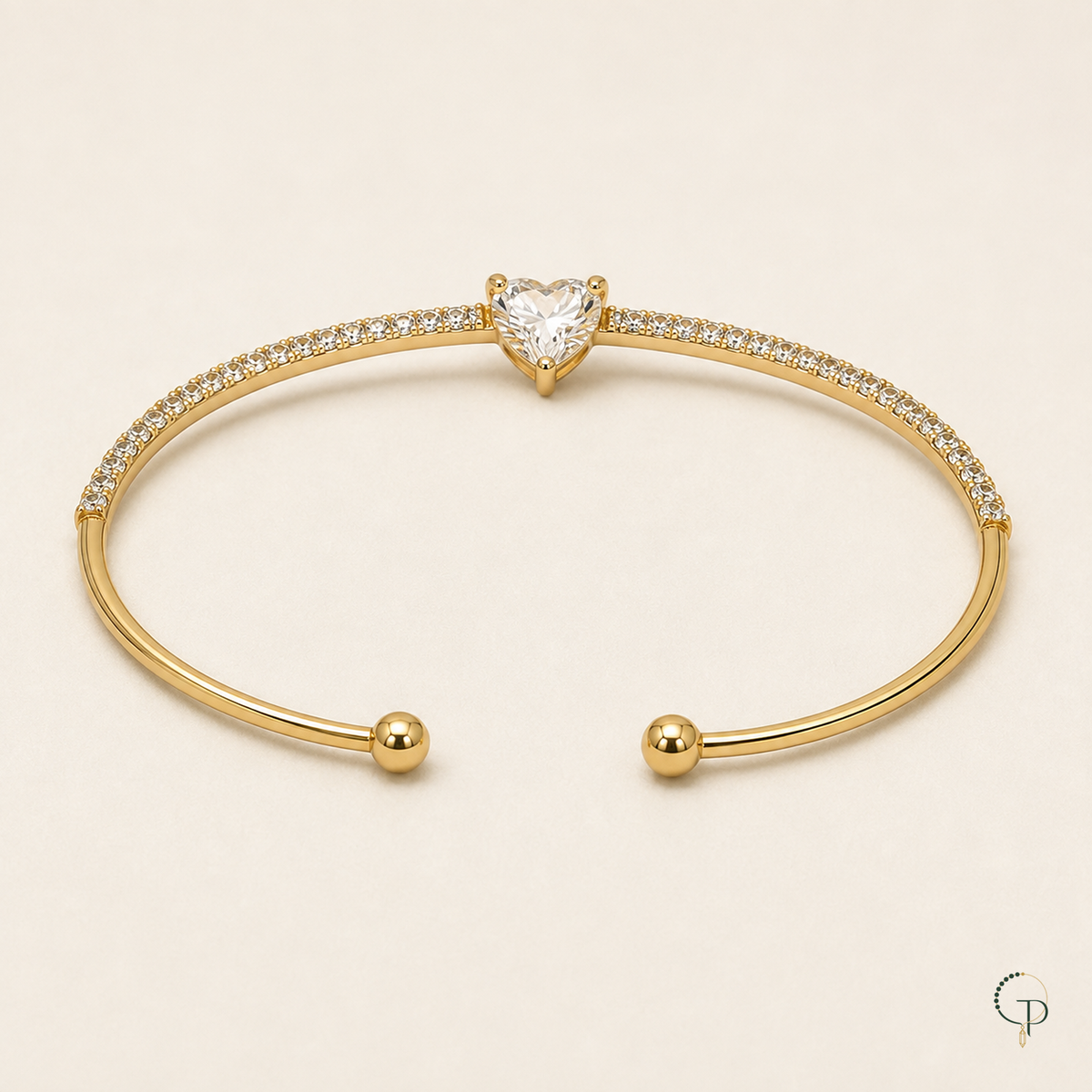 Rear view of the open cuff showing smooth gold-color arms and two rounded ball tips.