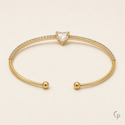 Rear view of the open cuff showing smooth gold-color arms and two rounded ball tips.