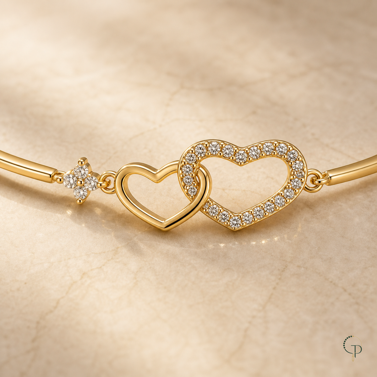 Close view of one smooth and one clear pavé-style interlocking heart