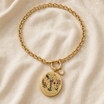 Full gold-color statement chain with oval Love Never Dies medallion laid flat