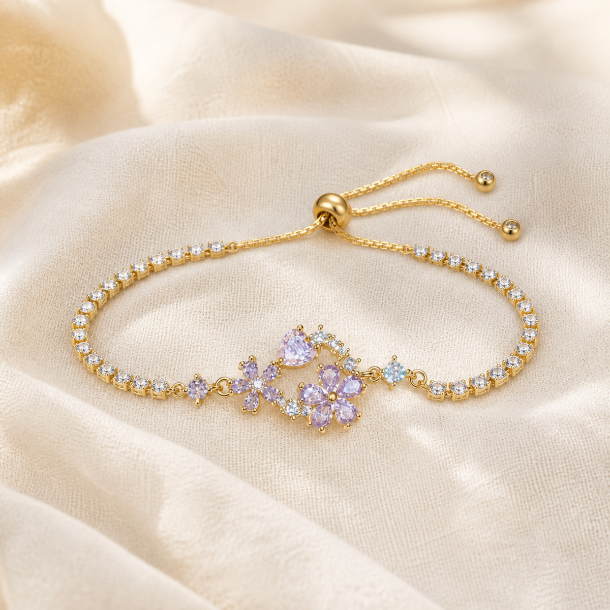Purple floral crystal tennis bracelet with gold-color adjustable slider chain