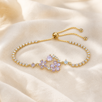 Purple floral crystal tennis bracelet with gold-color adjustable slider chain