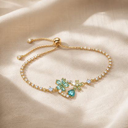 Green floral crystal tennis bracelet with gold-color adjustable slider chain