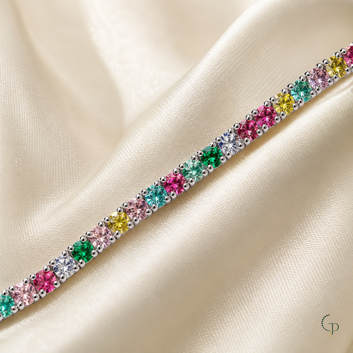Macro detail of pink, aqua, green, yellow and clear round stones in one row