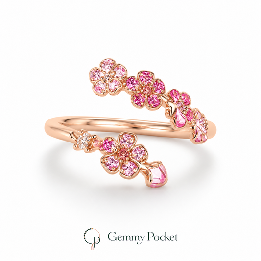 Rose-gold-color pink blossom bypass ring on a seamless white studio background