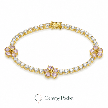 Pink blossom tennis-style bracelet on a pure white studio background