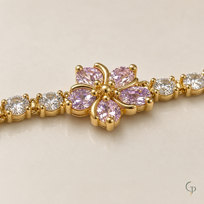 Side detail of pink blossom prongs and clear-stone bracelet links