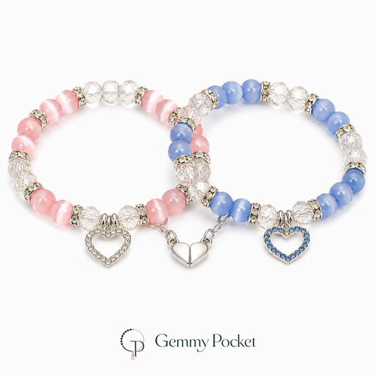 Pink and blue two-piece magnetic heart friendship bracelet set on white