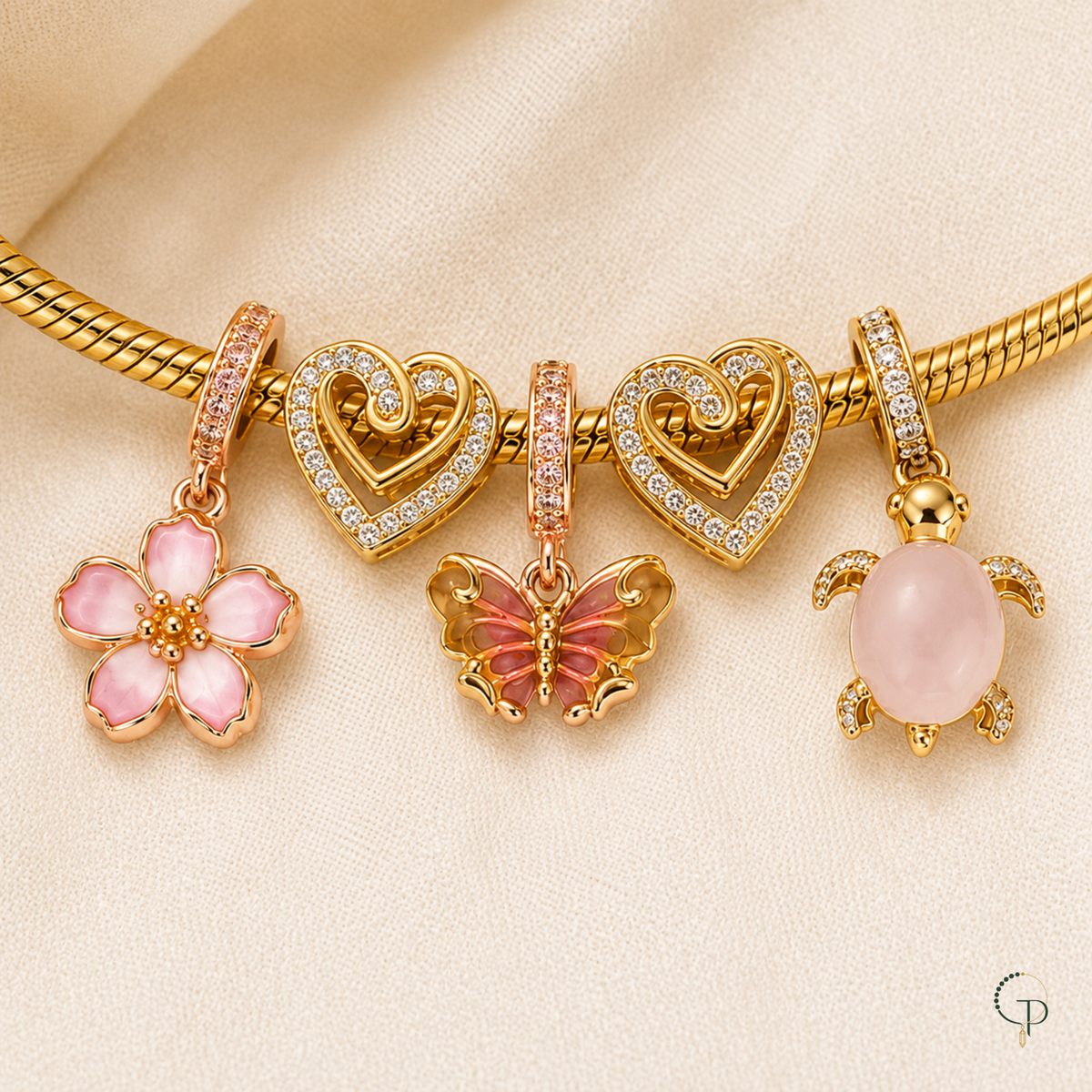 Close-up of pink flower, butterfly and turtle dangles with two double-heart beads