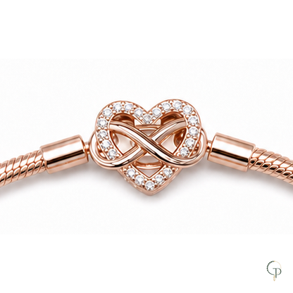 Close view of the heart-shaped infinity clasp and snake-chain ends