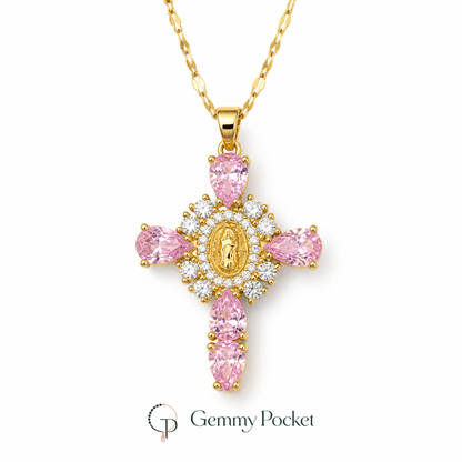 Pink teardrop halo cross pendant necklace on a pure white studio background