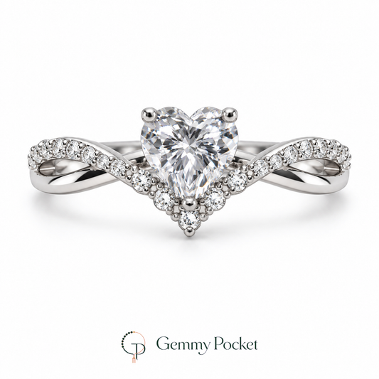 Silver-color heart ring with intertwined polished and stone-accented shoulders on a white background.
