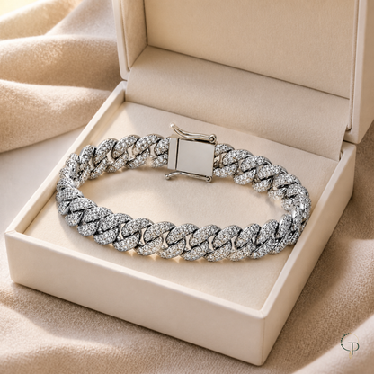 Silver-color pavé Cuban link bracelet in an unbranded ivory box