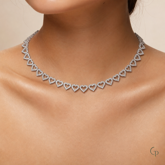 Silver-color open heart link collar necklace worn around the collarbone