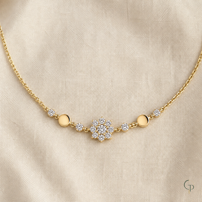 Gold-color clear-stone snowflake station bracelet on oatmeal linen