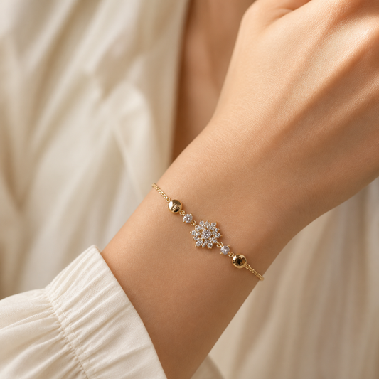Clear-stone snowflake bracelet worn alone on the wrist
