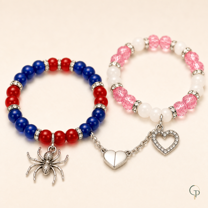 Spider charm bracelet detail with connected magnetic heart and matching bracelet