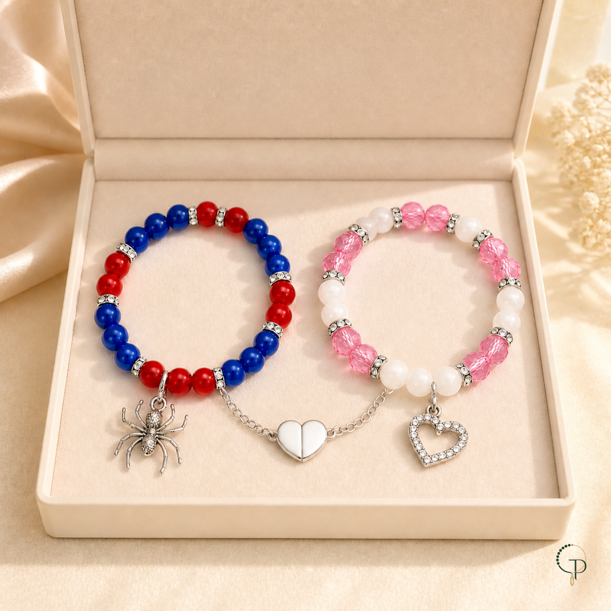 Two-piece spider and heart friendship bracelet set in an ivory gift box