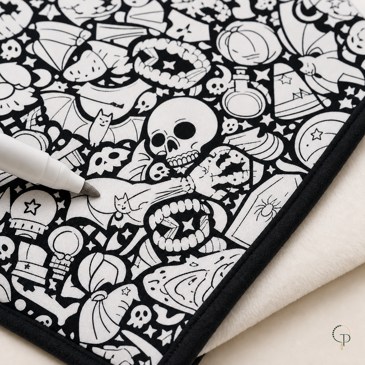 Close-up of the coloring surface, stitched edge and soft white backing