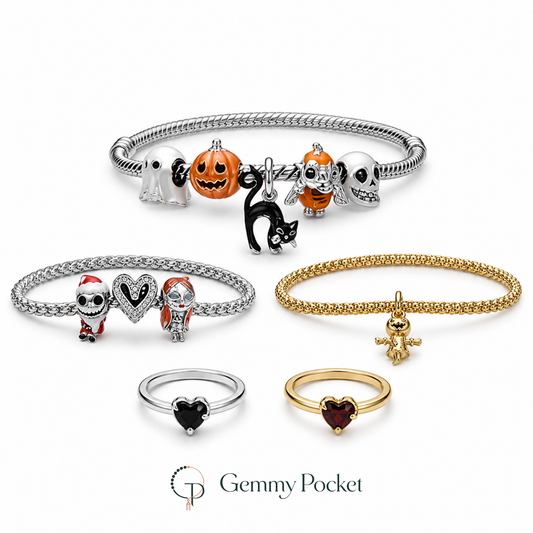 Five-style charm jewelry collection with three bracelets and two heart rings on white