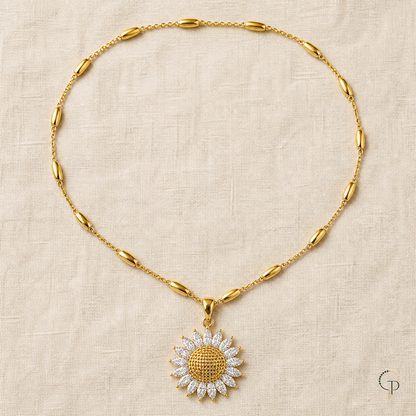 Full sunflower pendant necklace arranged on warm cream linen
