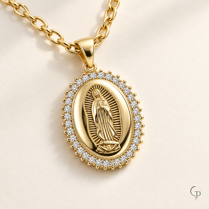 Angled detail of the medallion bail and gold-tone chain links