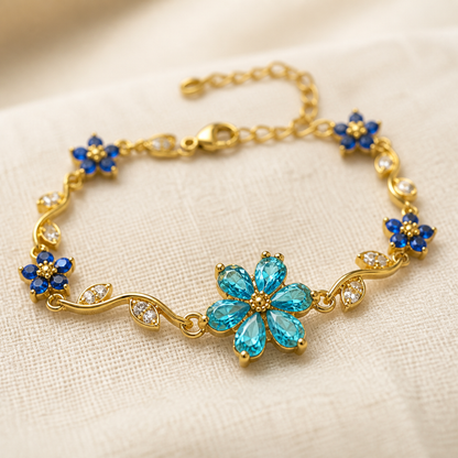 Close view of the aqua six-petal flower and clear-stone leaves